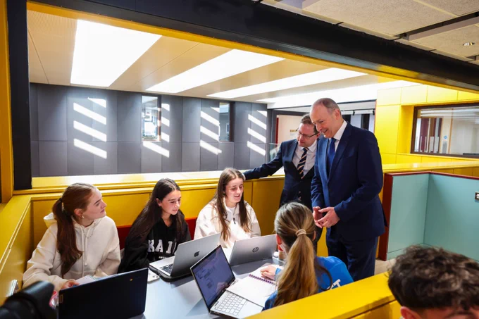An Taoiseach Micheál Martin TD and James Lawless TD, Minister for Further and Higher Education, Research, Innovation and Science speak to students at the official opening of the Polaris Building on Dublin City University's Glasnevin Campus Photo: Kyran O'Brien