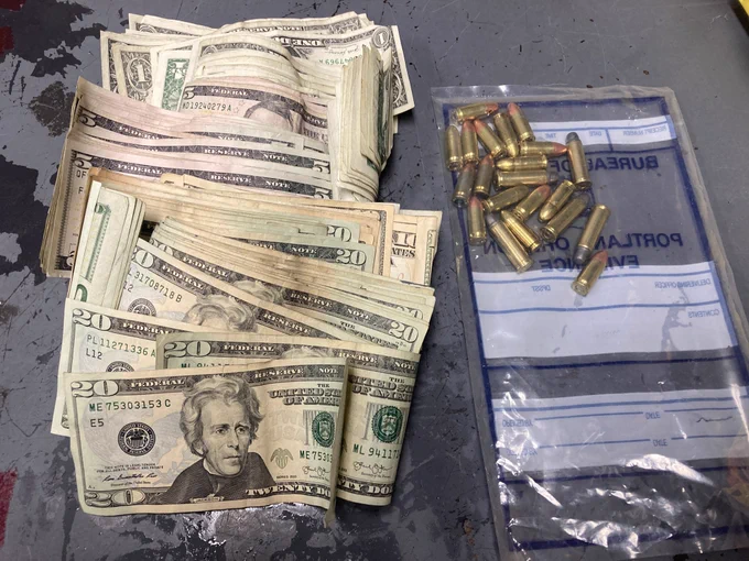 Money and bullets from tent.