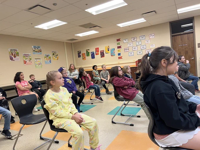 students listen to the presentation