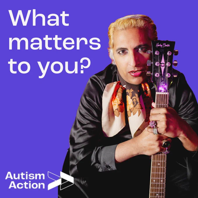 A man with blonde hair, eye makeup and lipstick sits holding the neck of the guitar that's standing in front of him. He's wearing big, unusual rings on three fingers and a distinctive neckerchief, as well as a silky black shirt. The caption 'What matters to you?' appears in white text on a purple background and a white Autism Action logo is at the bottom left. 