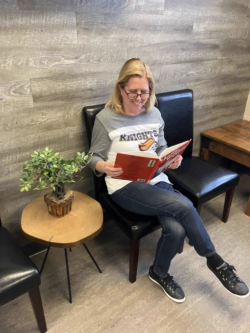 Mrs. Smith reads a favorite book