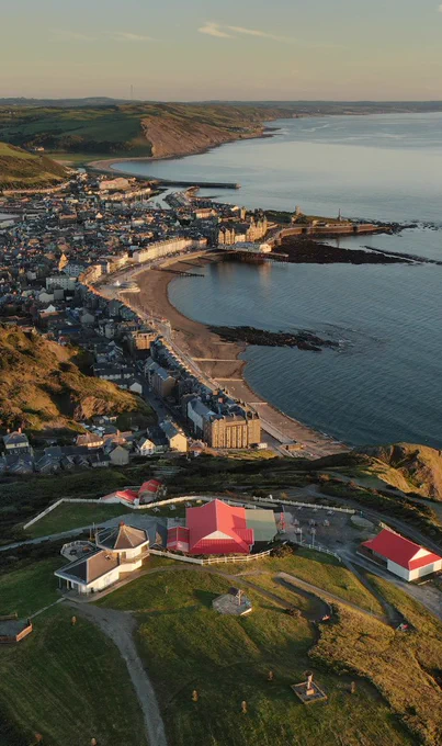 An aerial view of Aberystwyth, taken above Constitution hill and looking south, over the town and Ceredigion Bay.