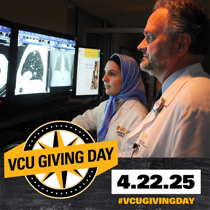 Man and woman wearing white lab coat looking at medical images on a computer screen with V C U giving day logo and date April 22 20 25