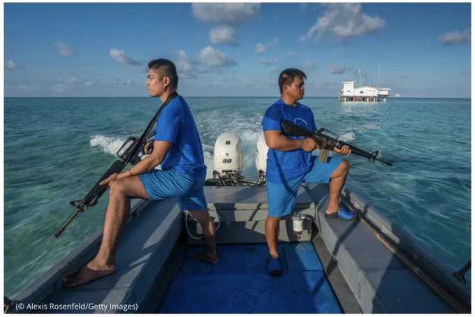 Tubbataha rangers patrol the waters of the marine reserve April 24, 2018, in the Philippines. (© Alexis Rosenfeld/Getty Images)
