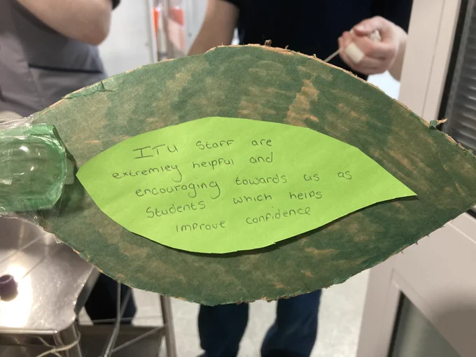 A card leaf with a handwritten message on it