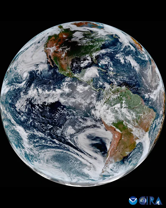 A full disk geocolor image from GOES-16 that shows the moon's shadow over North America.