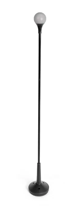 A cane with a light bulb shaped bulb at the top, and a stair guard.