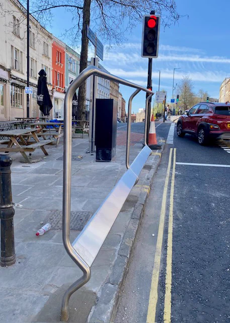 Newly installed cyclists foot/hand rest at traffic lights on Upper Maudlin St, Bristol, UK 