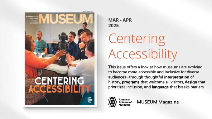A picture of people sitting around a table looking at a museum exhibit
