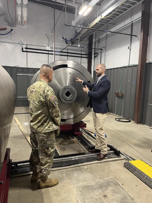 Two people standing inside of the Ballistic, Aero-optic and Material range on the Texas A&M RELLIS campus in Bryan, Texas.