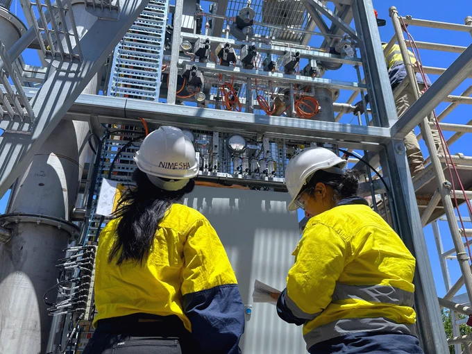 RMIT researchers inspect the operation of the PYROCO Mark-2 pilot unit at Melton Water Recycling Plant. 