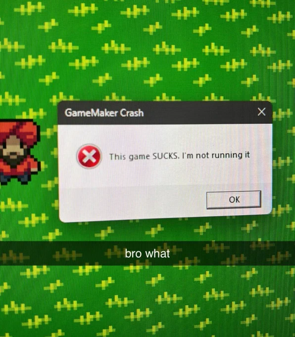 GameMaker Error pop up with "This game SUCKS. I'm not running it" In the background is pixel art Gurpreet "bro what" is in the foreground 