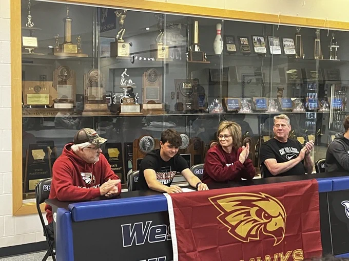 Seth Axsom and Ryker Dengler signing