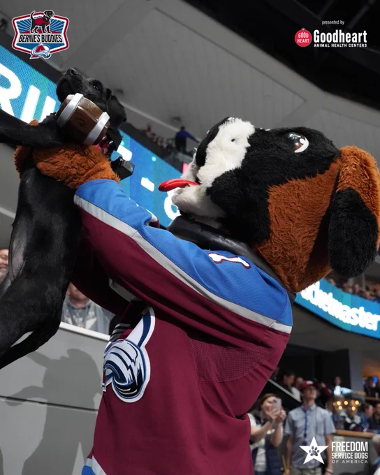 Bernie holding up Maxy