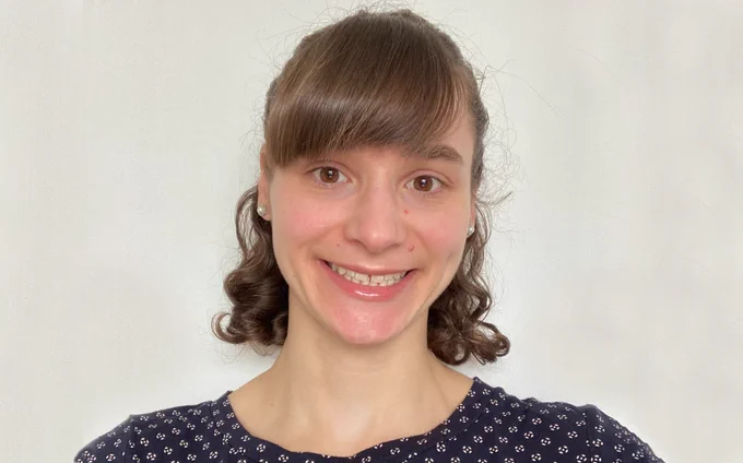 A head and shoulders portrait shot of Dr Arianne Babina 