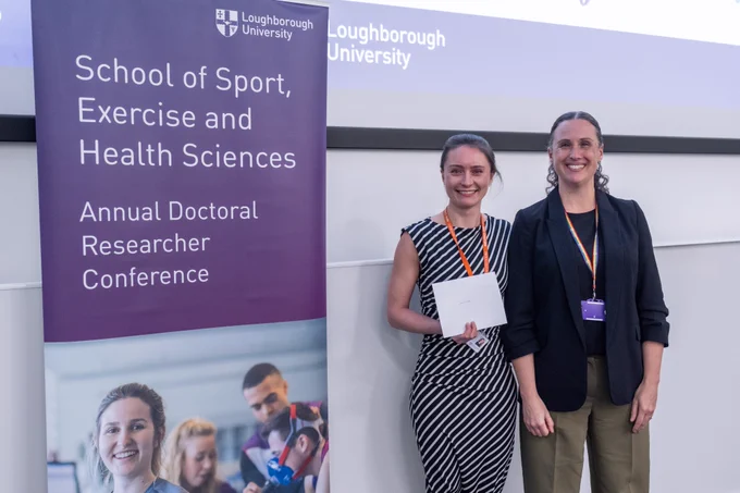 Jess receives her award from Professor Lauren Sherar, Dean of the School of Sport, Exercise and Health Sciences
