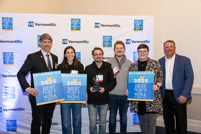 The Bytes.co team accepting the Best Places to Work in Vermont 2025 award