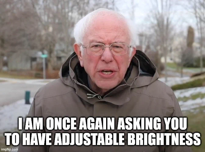 Meme of Bernie Sanders with the caption, "I am once again asking you to have adjustable brightness."