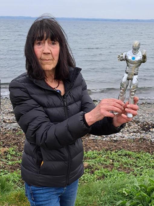 Lesley pictured with an action figure she found on the beach