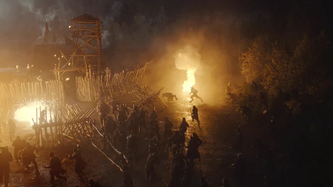 The Trollocs attack the Two Rivers in firelight.