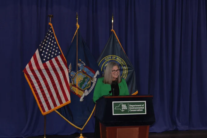 EFC President and CEO Maureen A. Coleman stands at podium