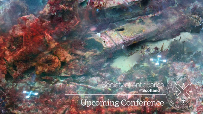 Digital image of a shipwreck with the text on it: Upcoming Conference 