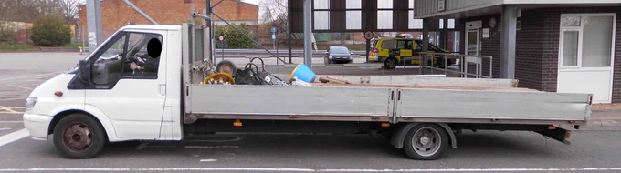 Side view of non-compliant light goods vehicle not fit for purpose.