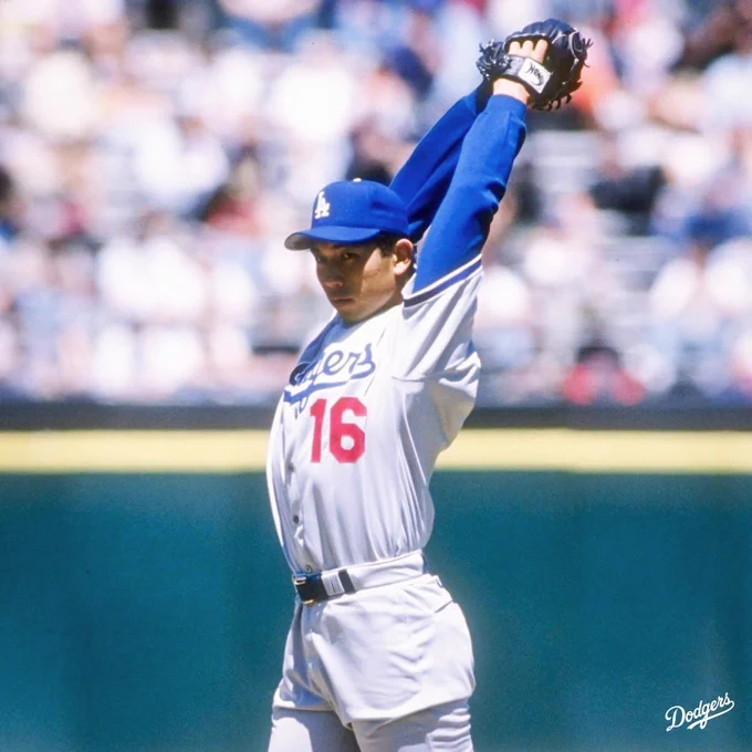 A photo of Hideo Nomo winding up to pitch.