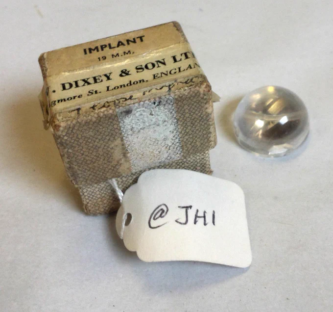 A small eye implant (19mm) and box it was contained in.