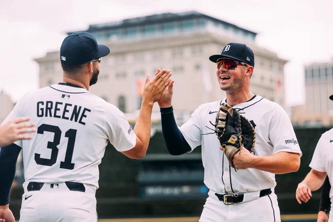 Spencer Torkelson high-fives Riley Greene after a Tigers win.