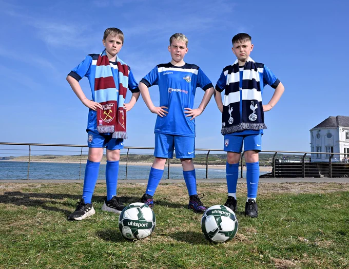 Coleraine Academy players Harry Hunt, Harry Blair and Daniel Caskey pictured at the Arcadia in Portrush to announce that English Premier League giants West Ham United and Tottenham Hotspur will headline a world-class 16-team line-up in the Boys’ Junior Section at the 2025 Budget Energy SuperCupNI.