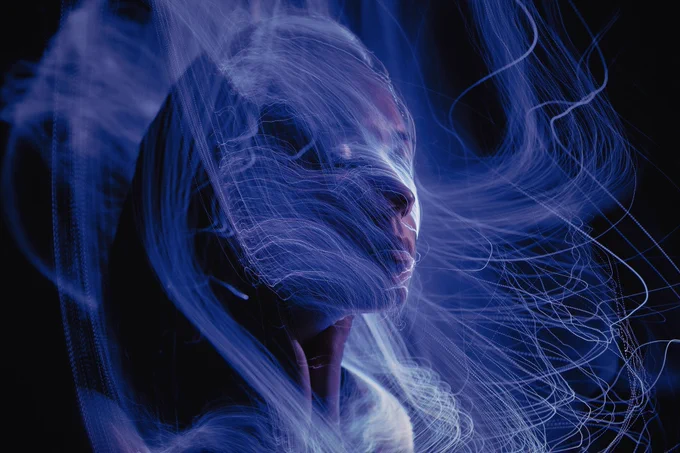 Speaking Towards One Another Porgramme Image with a person's head surrounded by a hazy atmosphere and blue background