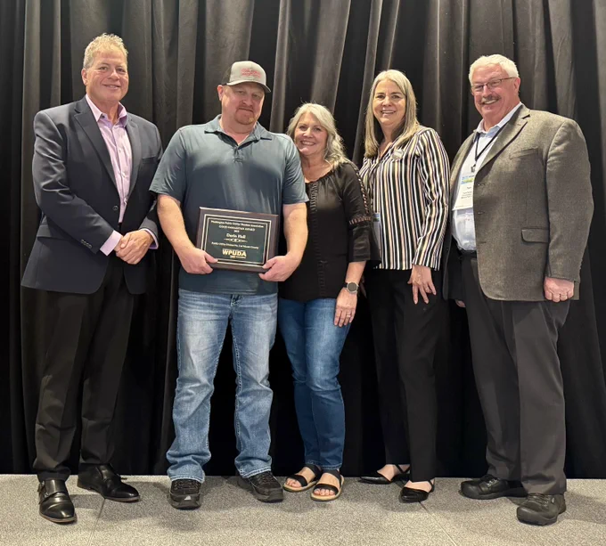 Darin Hall with his wife Laurie and PUD Commissioners Jeff McHargue, Juli Tuson, and Tom Farmer.