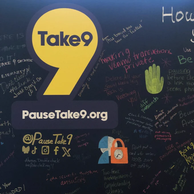 A photo of a chalk wall with the Take9 logo on it with writing around it.