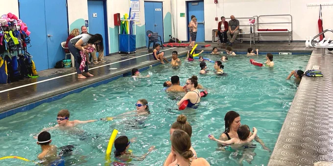 Photo of people in the shallow pool at Pullman Aquatic & Fitness Center