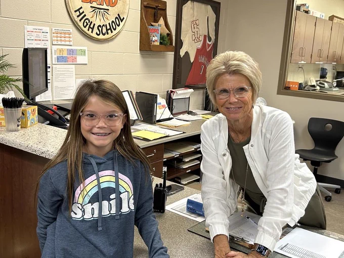 Mrs. Sands with a student