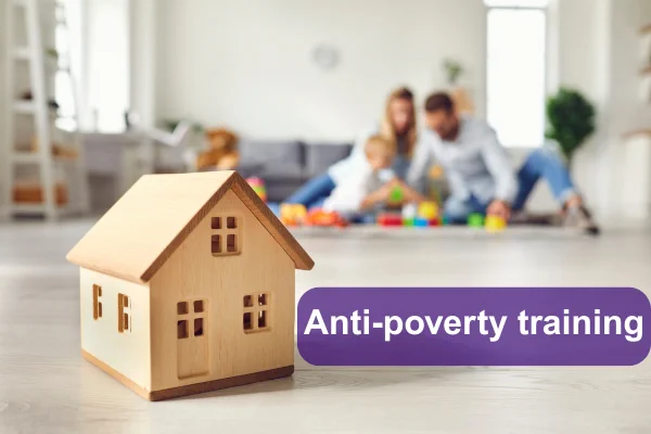 Image of a toy wooden house in the forefront of the image with a family in the background. Text over the image reads Anti-poverty training
