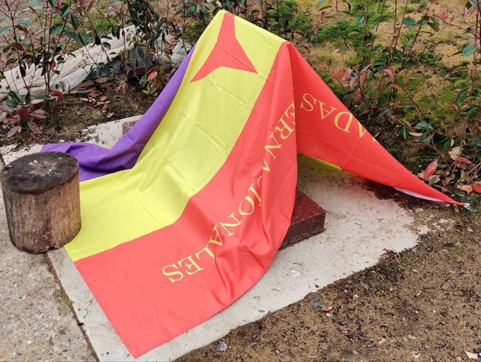 International brigades flag covering the memorial to be unveiled on Saturday
