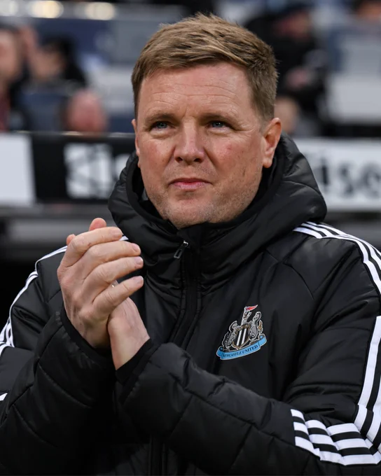 Eddie Howe pictured clapping fans.