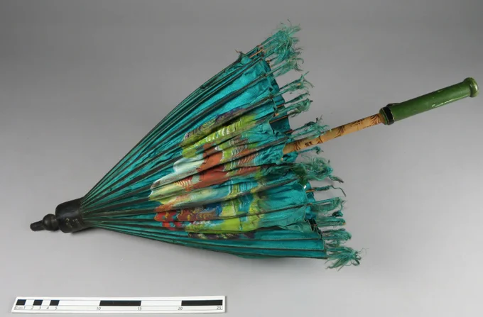 https://www.prm.ox.ac.uk/collections-online#/item/prm-object-225304
Umbrella of green painted silk with bamboo tube, Myanmar