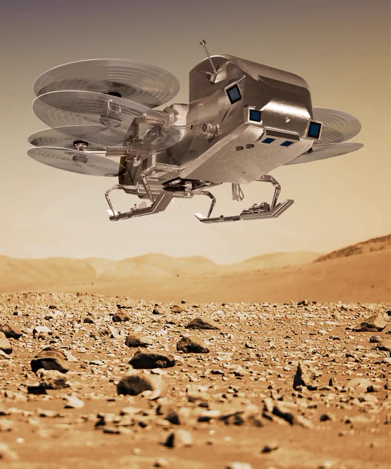 Illustration of the Dragonfly robotic rotorcraft flying above the surface of Titan. Dragonfly has eight spinning propellers, several cameras, and landing skids similar to a helicopter.