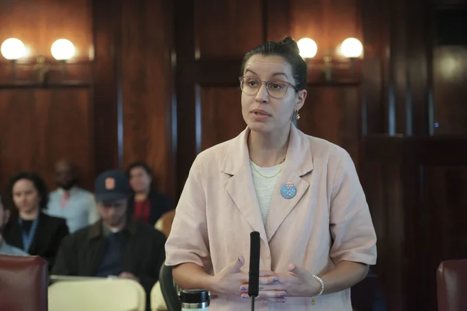 CM Caban speaking in council chambers