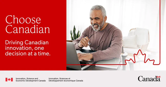 A man working on a laptop at the dining table. Text: Choose Canadian. Driving Canadian innovation, one decision at a time.