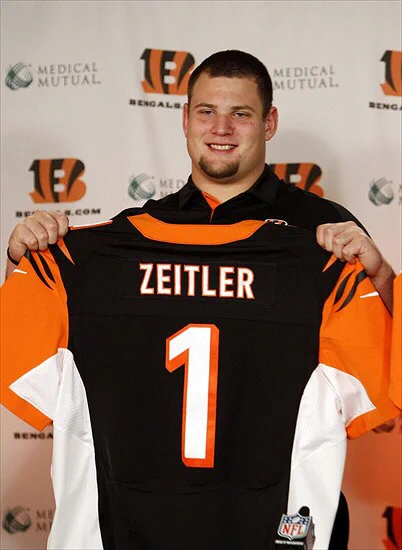 Kevin Zeitler holds a Cincinnati Bengals jersey after being selected with the 27th overall pick in 2012