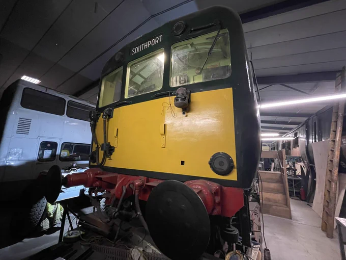 502 cab freshly painted green with yellow warning panel