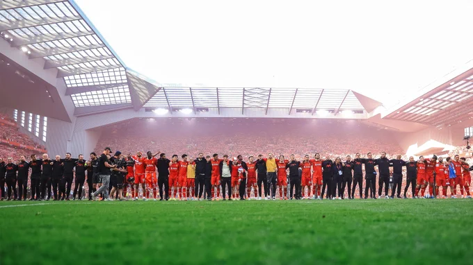 Photography of the Liverpool team at full-time.