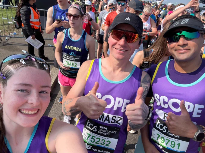 Team Scope London Marathon finishers at the finish line.