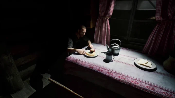 male character in the cabin factory sits at a table, a plate with an apple and banana on it in front of him
