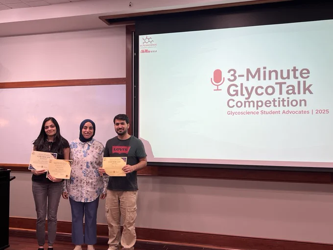 Image of Gaya Dasanayake (second place and audience favorite), Marwa Farrag (GSA President), and Tahir Ali (first place), 