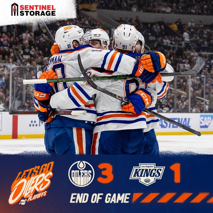 End of game graphic with a photo of the Oilers celebrating a goal 